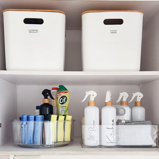 Shelving unit with storage bins labeled 'Cleaning Product' and 'Toilet Paper', and various cleaning supplies below.